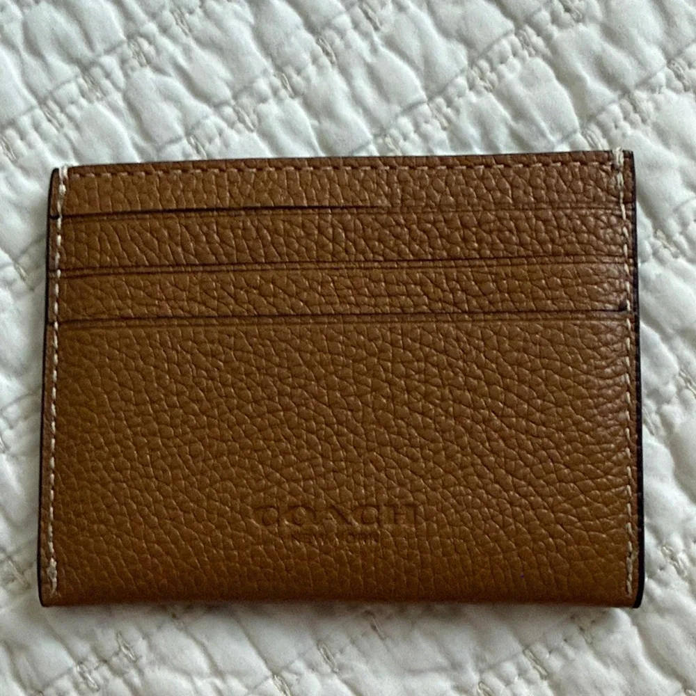 Coach excellent only